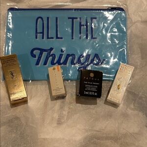 YSL pluming Lip oil Gloss Nude lavallier and assorted Tatcha products